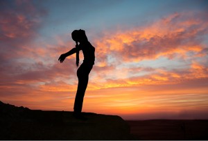 Outdoor sunrise yoga girl